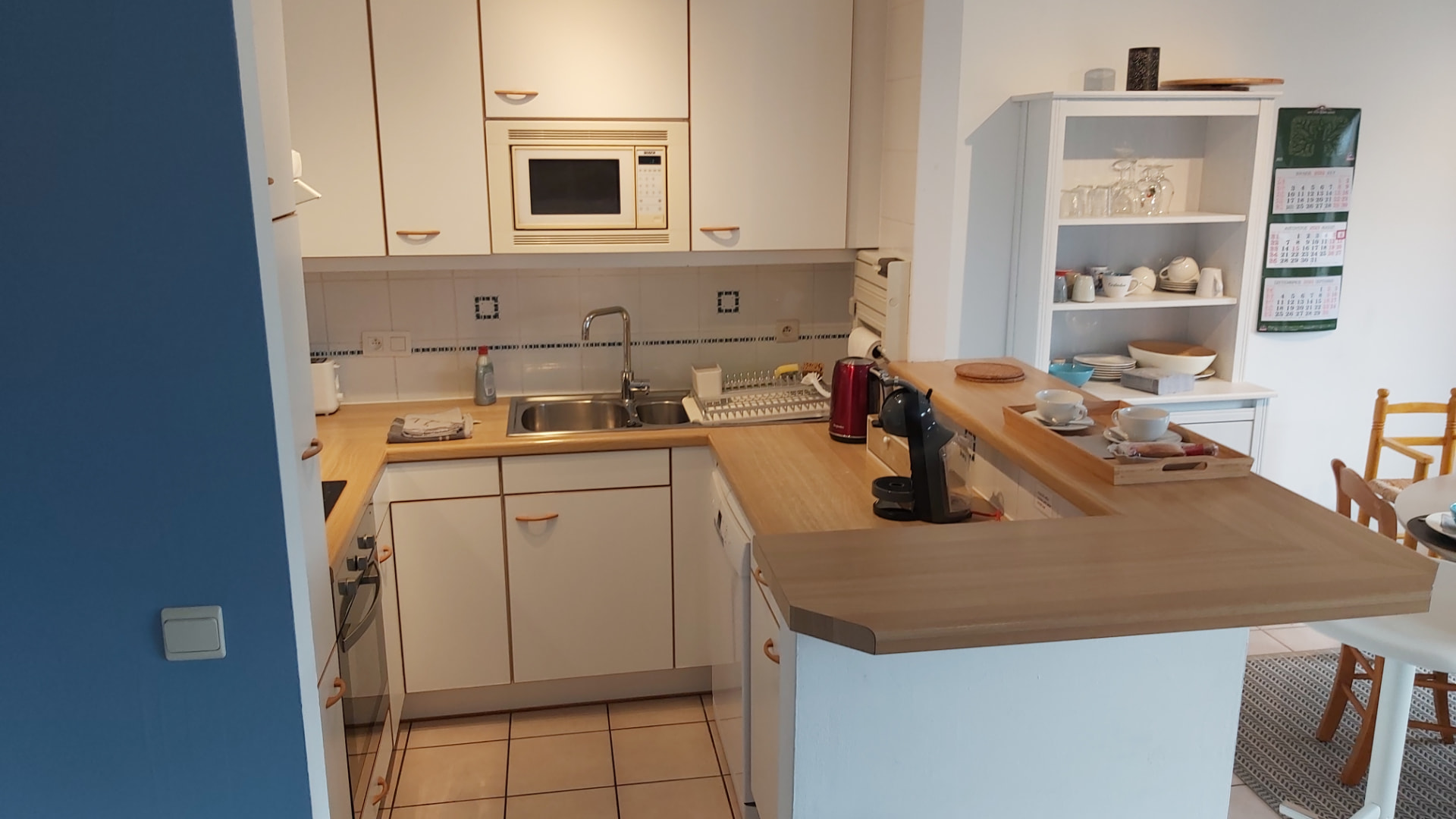 Cuisine équipée du Bruyères lodge avec comptoir en bois